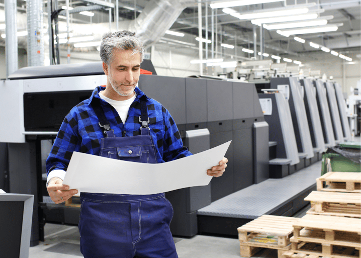 Commercial Printer Examining Print Project